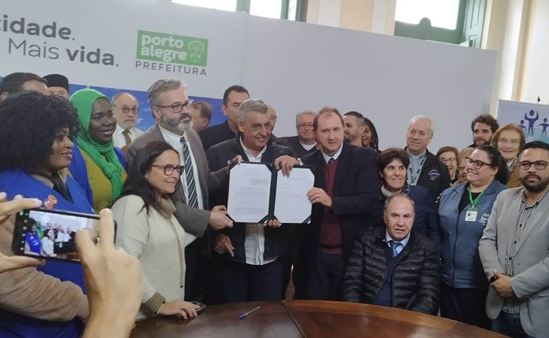Lei municipal garante atendimento aos migrantes